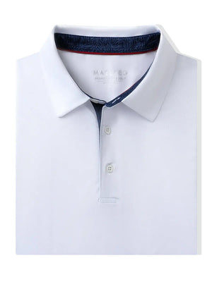 Folded White Everyday Classic Solid Polo neatly laid out for display