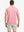 Back half-body view of Modern Texture Stylish Polo in CARMINE worn by model.