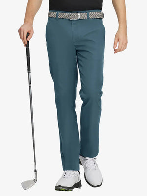 DARK TEAL Water Resistant Everyday Pants front view, model's lower body holding a golf club