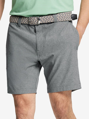 Front view of youth wearing light grey Heather Performance Golf Shorts, showing fit and style