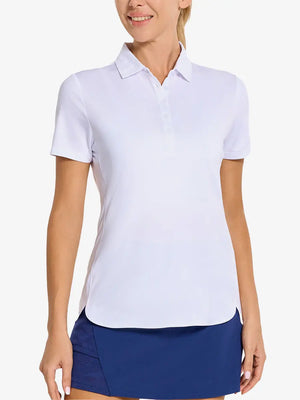 Front view from nose to hem of model wearing WHITE Women's Performance Solid Polo with skirt