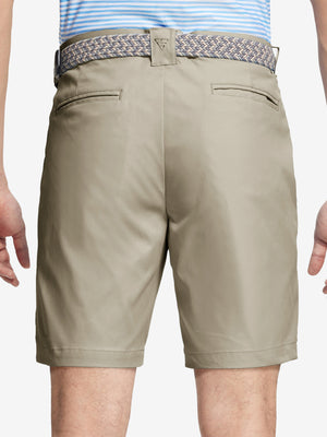 Back waist to knee view of khaki water resistant golf 9 inch shorts, flexible performance fit.