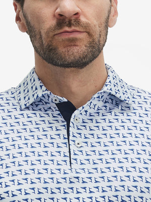 Close-up: nose to chest in white navy dolphin polo.