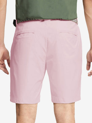 Back waist to knee view of pink water resistant golf 9 inch shorts, flexible performance fit.