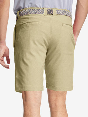 Back view of youth in khaki Heather Performance Golf Shorts, highlighting rear design and fit