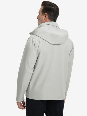 Back view of model in lightweight water-repellent softshell hooded jacket showing fit and structure in glacier grey.