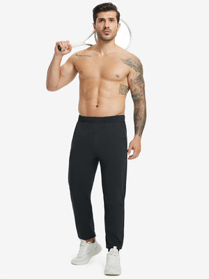 Full body front view of model wearing Water Resistant Comfy Fleece Golf Joggers in black