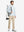 Full body model carrying golf bag in Water-resistant fleece lined pants, clean khaki look