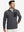 Model with one hand in side pocket, wearing midweight warm stretchy quarter zip pullover in grey.
