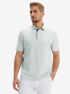 Front half-body shot of model wearing the silver gray ventilated pique performance polo for a casual sporty look