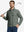 Model holding golf club, dressed in Golf Fleece Thermal Winter Jacket in Agave Green, sporty design.
