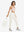 Full-body front view of model wearing women's stretch fleece lined water resistant joggers in beige.