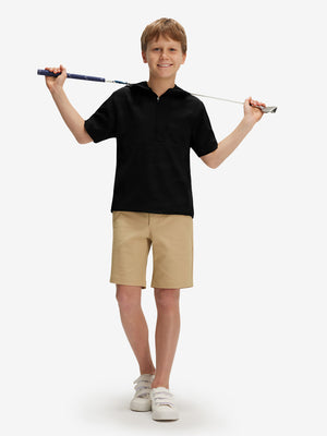 Full-body shot of model holding a golf club in black water-resistant short sleeve q-zip hoodie for boys
