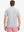 Back half-body view of model wearing LIGHT GREY STRIPE Stylish Performance Golf Polo