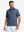 Front half-body shot of model wearing the blue quick dry jacquard ribbed collar golf shirt