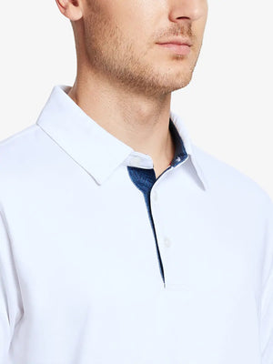 Male model wearing the White Everyday Classic Solid Polo, front view from nose to chest