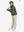 Model holding a racket, wearing army green boys windproof puffer jacket with pockets in full-body view.