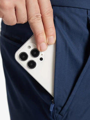 Close-up pocket detail with iPhone – Navy 9 Inch shorts by MAELREG