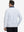 Back upper body view of the lightweight print polo in white nav clue, model turns slightly with relaxed pose.