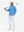 Model holding golf club wearing Fleece lined golf quarter zip in active sky blue