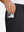 Hand placing an iPhone into pocket of soft lightweight casual golf pants with 5 pockets in black.