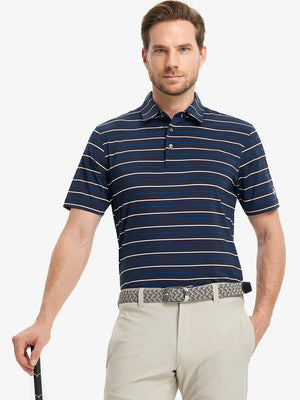 Model in NAVY STRIPE Golf Polo holding club — dynamic front half-body pose