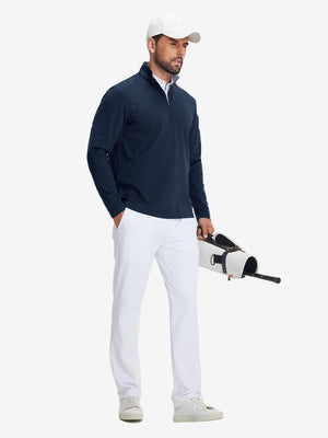 Model carrying golf bag in Fleece lined golf quarter zip with versatile navy look