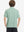 Back upper body of model in trendy boys stripe polo shirts, showing silhouette and light green stripe tone