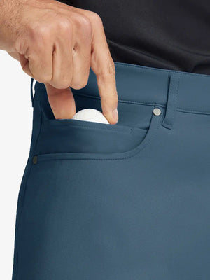 GRAYISH BLUE 4-way Stretch Performance Solid Shorts, front pocket holding golf ball detail, 7 Inch