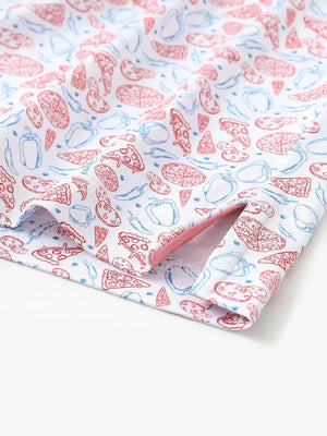 Hem slit detail of MAELREG Performance Jersey Print Polo in White Pizza – comfort & movement