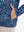 Model with both hands in pockets wearing youth full print stylish hoodies pullover in navy colorful flower.