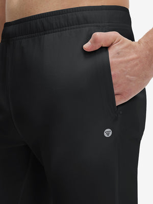 Front zipper pocket detail of black superion softness mesh joggers with zipper pockets