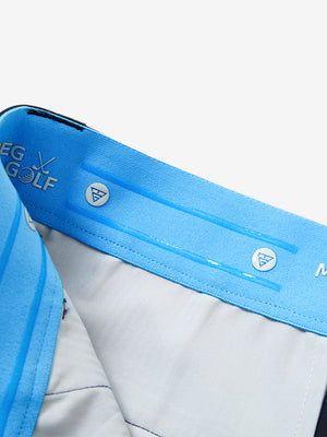 Inside waistband detail of water-resistant golf stretch nylon pants featuring maelreg logo, navy.