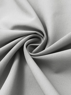 Fabric detail of Windproof golf vests with zip pockets showing smooth texture in silver gray