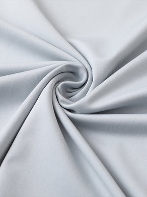 Close-up of greyglacier grey premium performance polo fabric showing smooth texture.