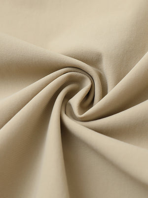 Close-up of quick dry casual dress pants fabric in khaki, smooth texture with breathable finish