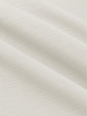 Close-up shot of soft heather knit fabric and fine textile texture, heather midlayer golf hoodies in light khaki heather