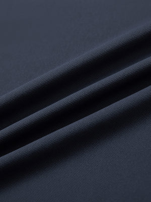 Close-up of dark grey everyday classic solid polo fabric texture.