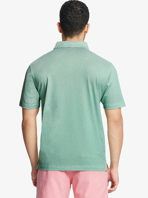 Rear half-body shot highlighting fit of EMERALD Performance Ananas Jacquard Polo