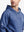 Front view from nose to chest of model wearing Classic Heather Fleece Hoodie in Blue Heather