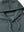 Close-up of hood and drawstring details on Green Heather fleece hoodie
