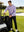 Model placing a golf club into a cart bag on course, styled in dry fit stretchy sweatshirts hoodies with lavender