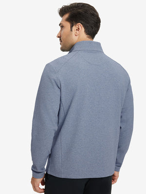 Back upper body view of model wearing textured insulated winter jacket, smooth finish, blue heather.
