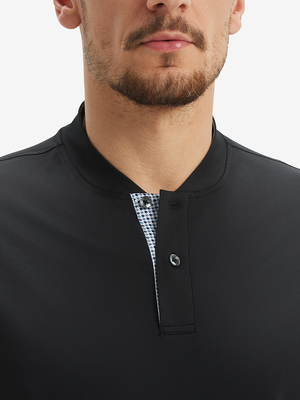 Close-up of model in black moisture-wicking short sleeve henley shirt, nose to chest front view.