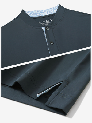 Detail of dark grey moisture-wicking short sleeve henley shirt showing collar and hem vent construction.